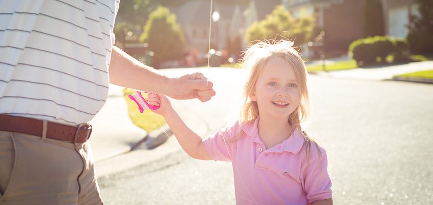 Girl flying kite with Dad | Kelley K Photography