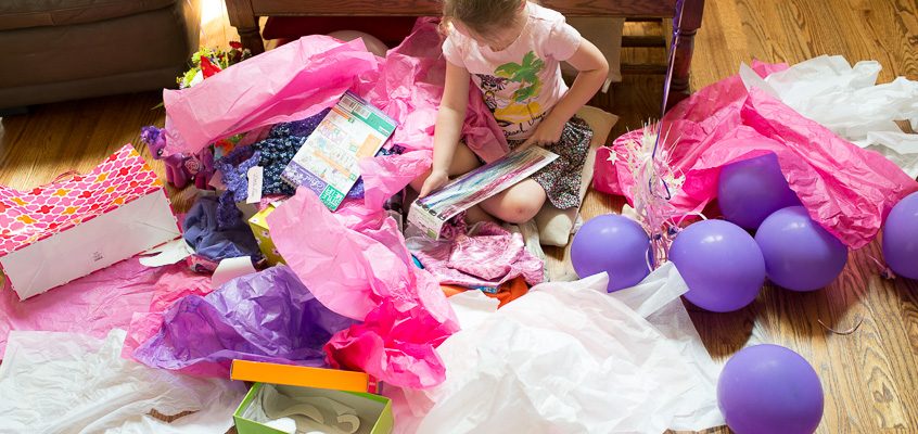 Birthday girl opening gifts | Kelley K Photography