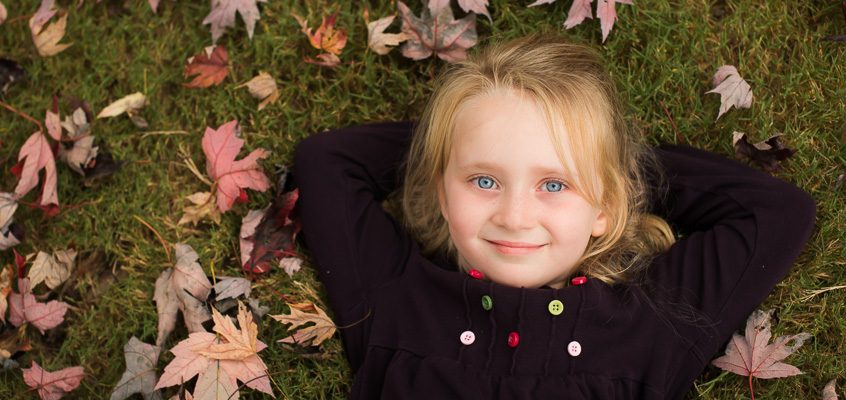 Girl in fall leaves | Kelley K Photography