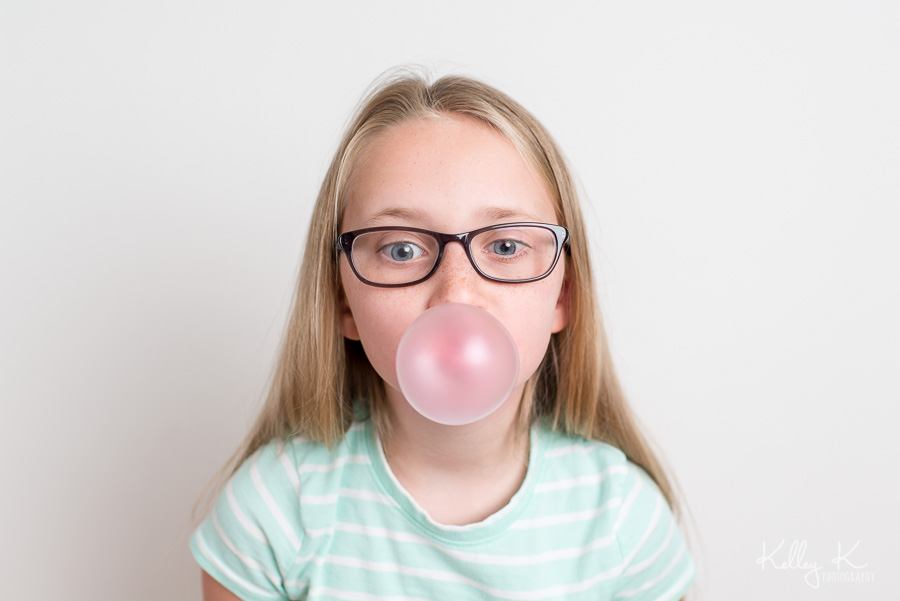 Girl-blowing-bubble-KelleyKPhotography-SmyrnaGA