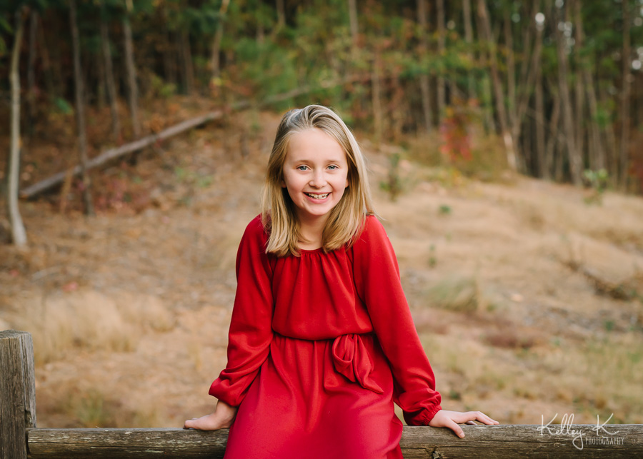 Girl-red-dress-fence-KelleyKPhotography-SmyrnaGA