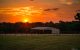 Landscape photo of sunset on a ranch in North Texas